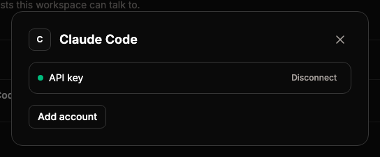 The Claude Code dialog with one API key account, its Disconnect button, and Add account.